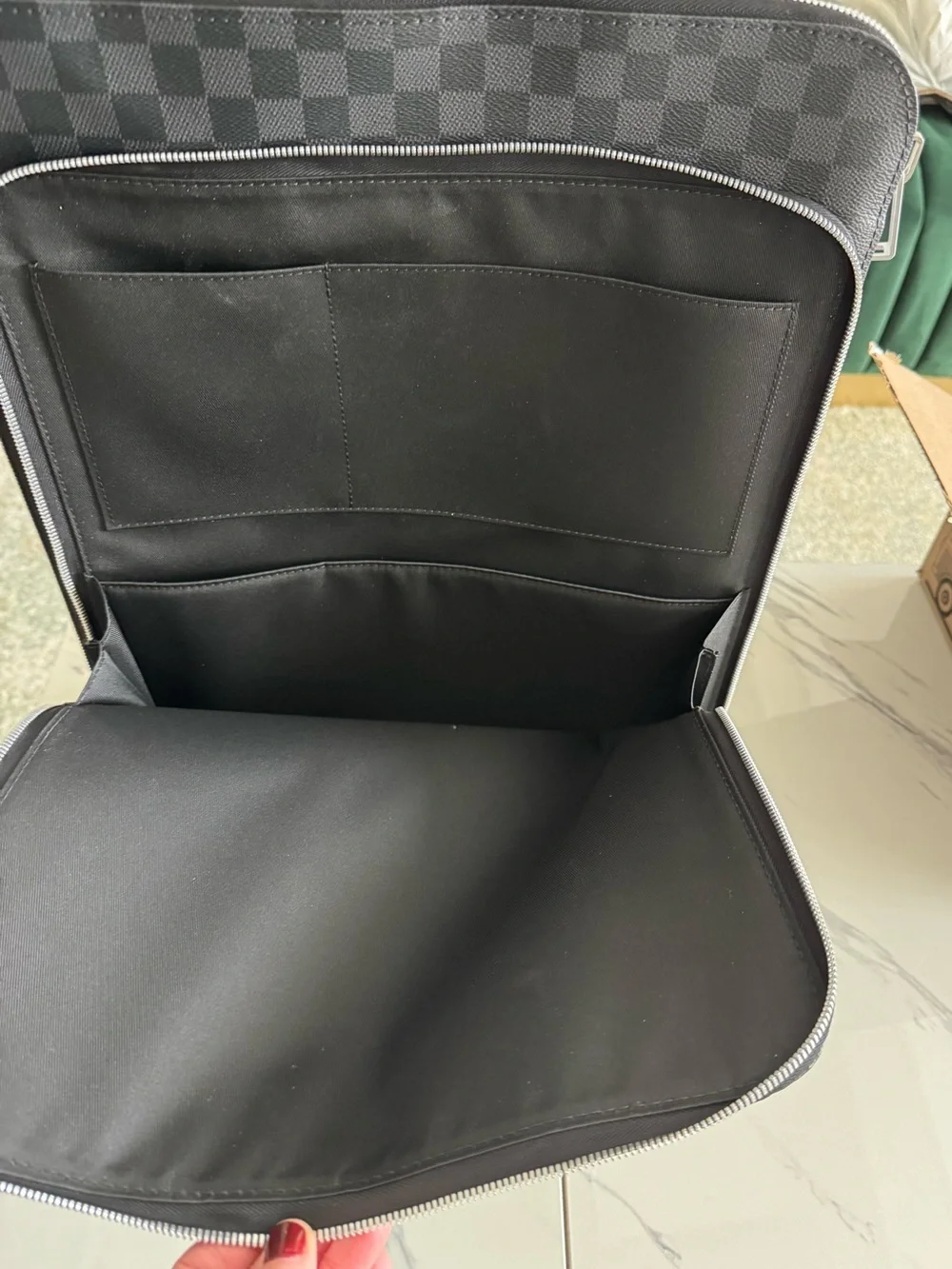 Louis Vuitton black  Checkered Carry-On Bag with Top Handle.